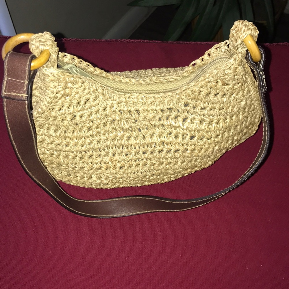Cappelli,straw purse with zipper.
